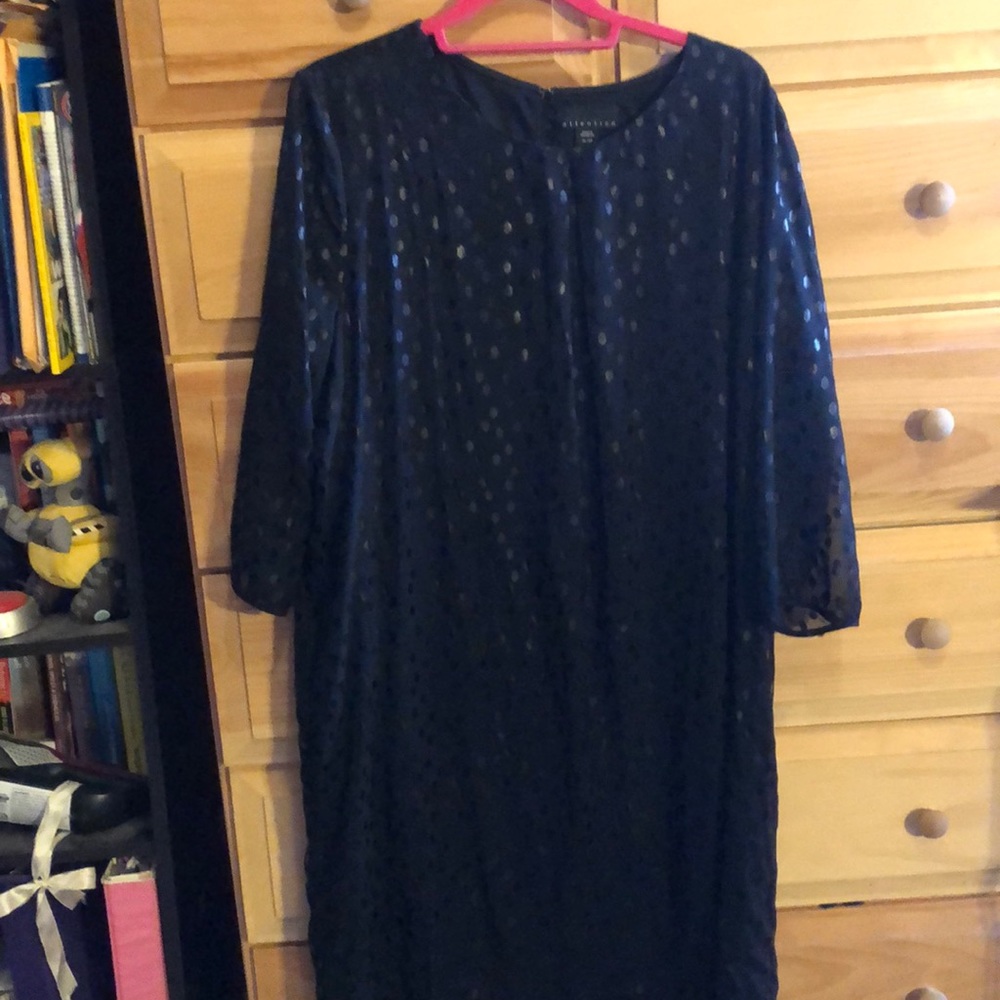 Black polka-dot shift dress